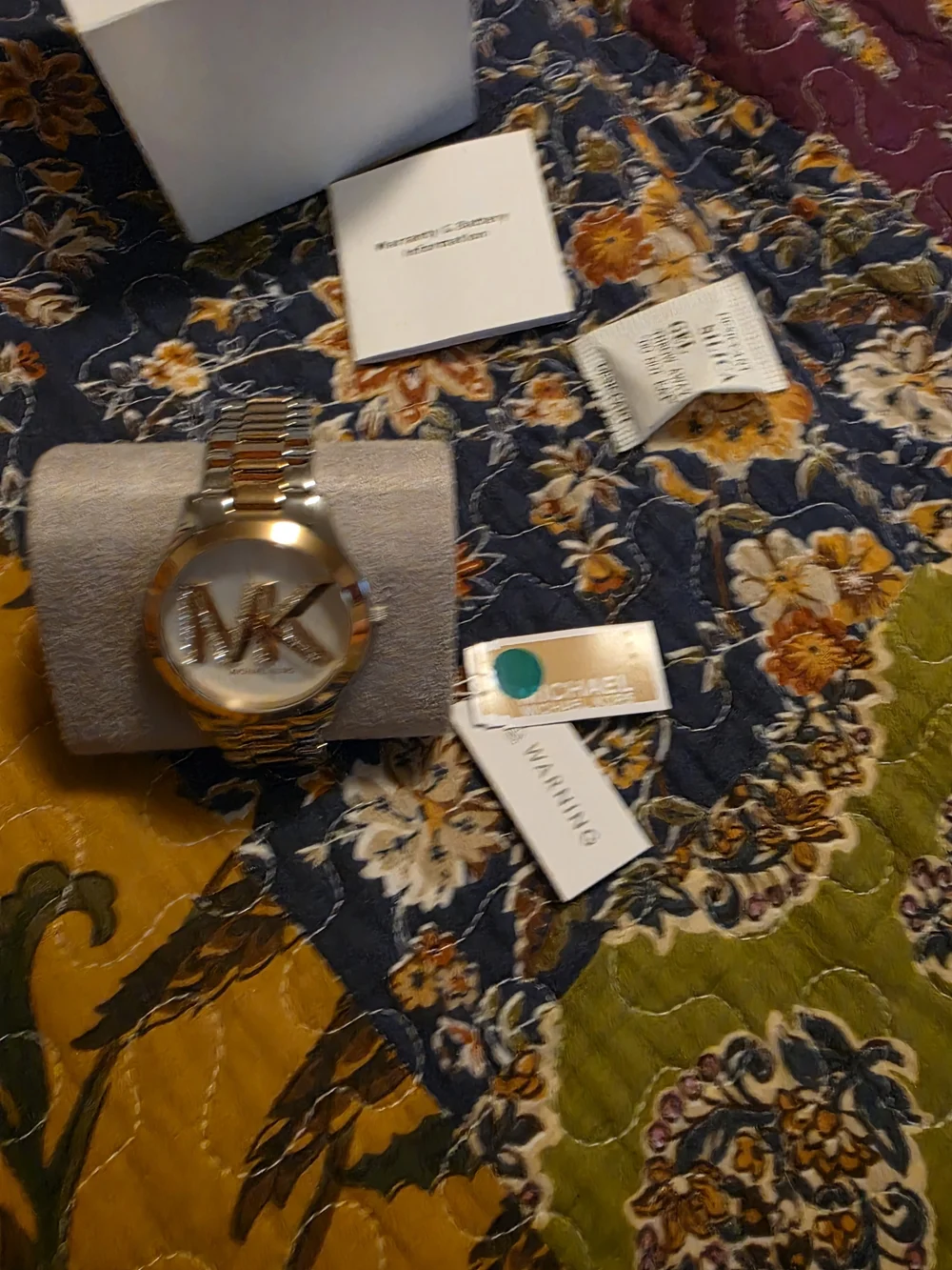 Womens Michael Kors Two Tone Gold And Silver Crystal MK Logo Watch Face.